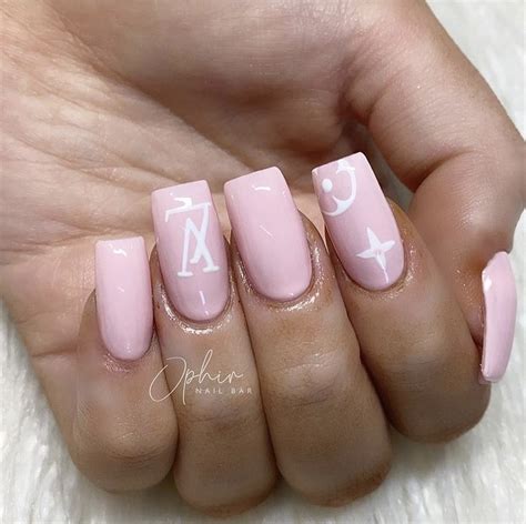 pink nails with louis vuitton on ring fingure|25 Latest Louis Vuitton Nails To Try In 2024 .